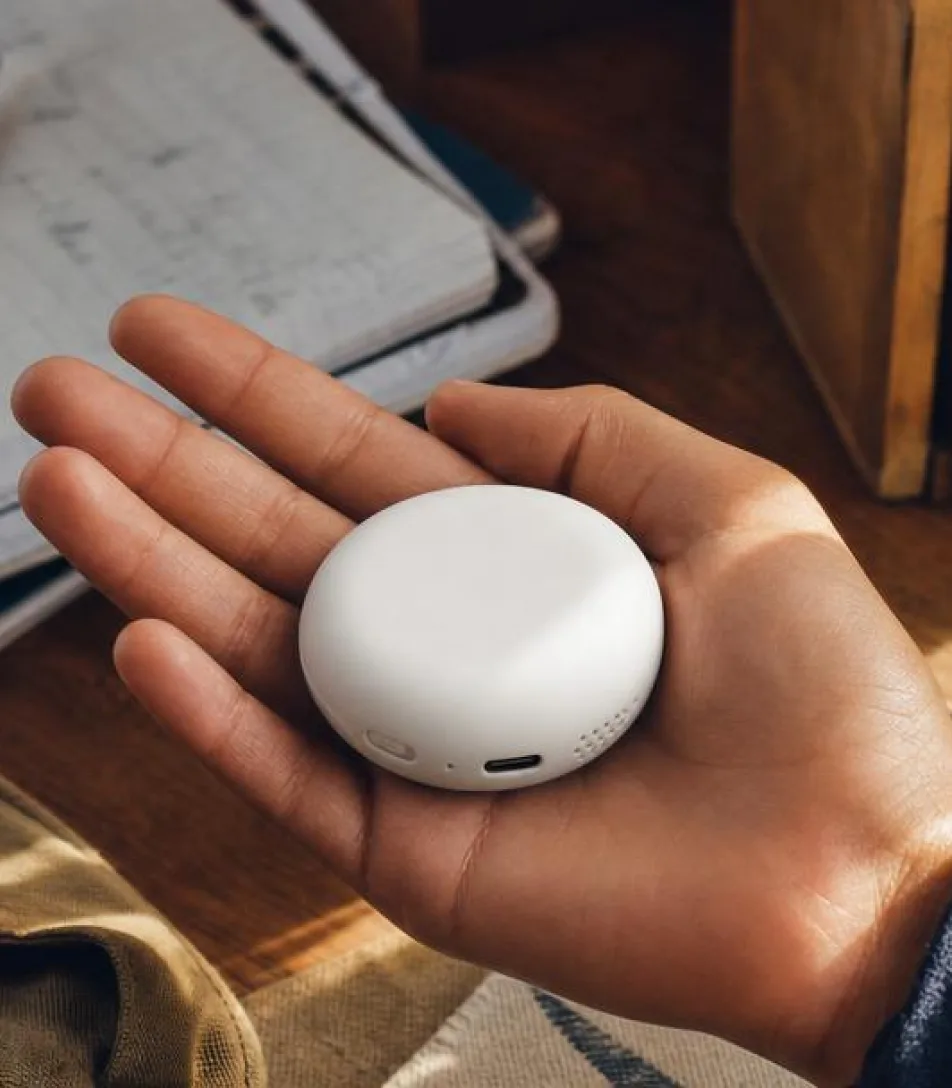 Device-in-hand pricing image.